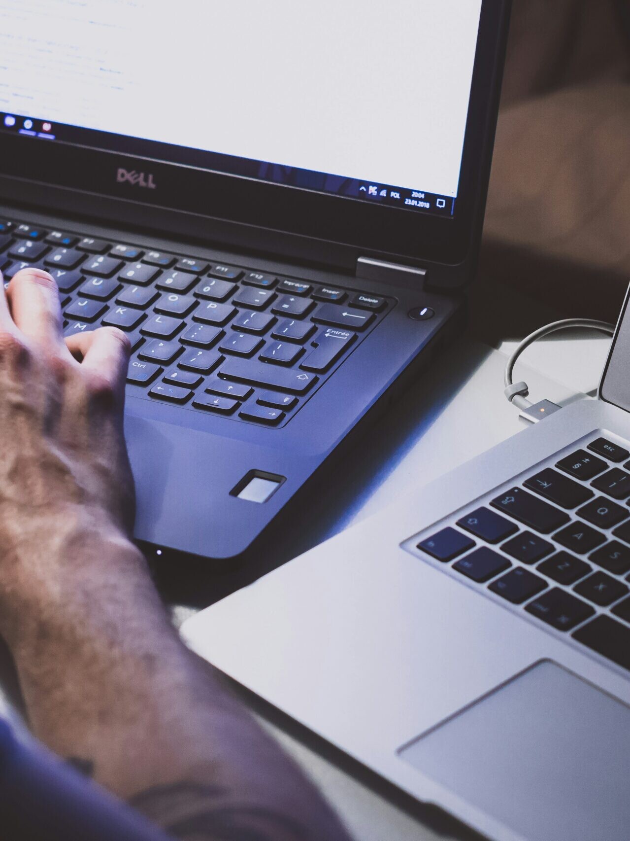 person using black laptop computer