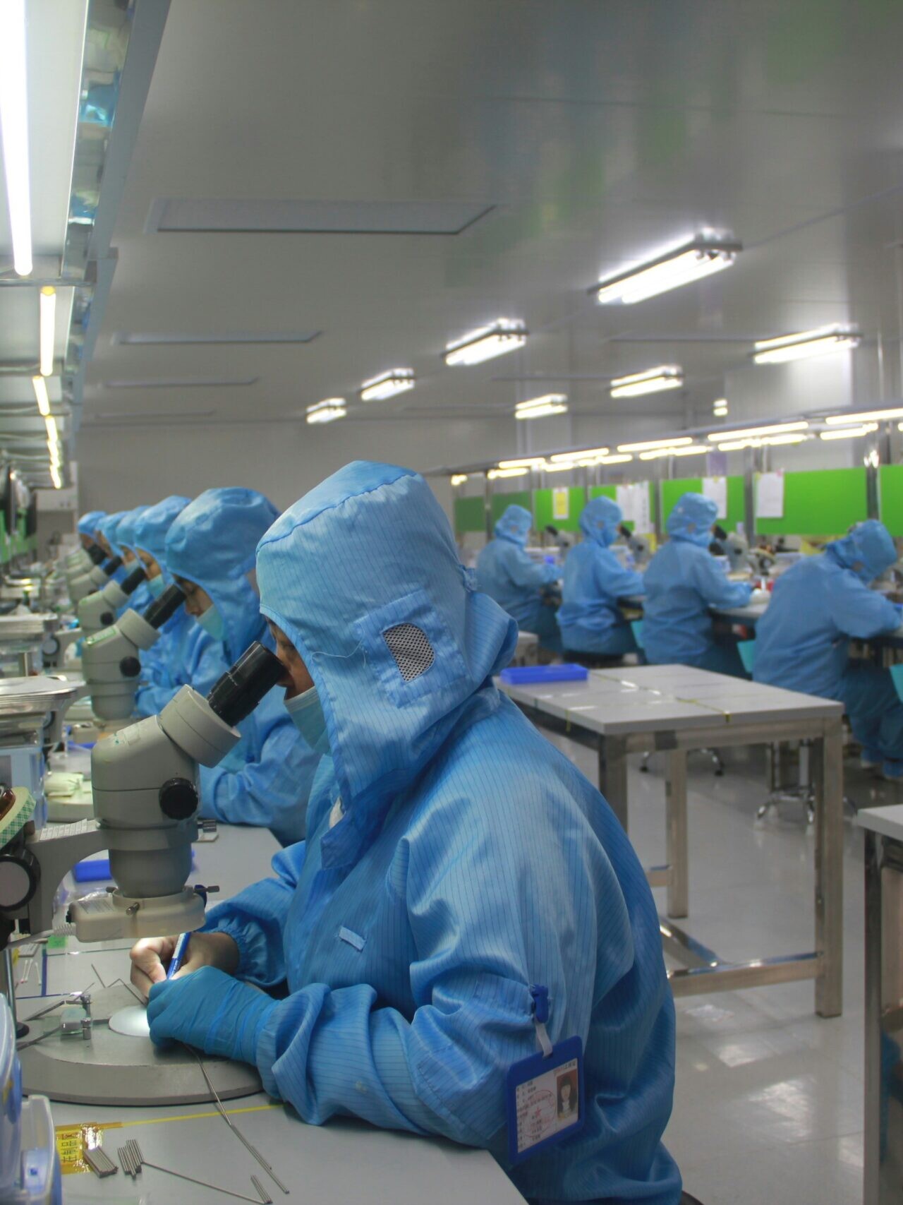 man in blue jacket wearing blue mask