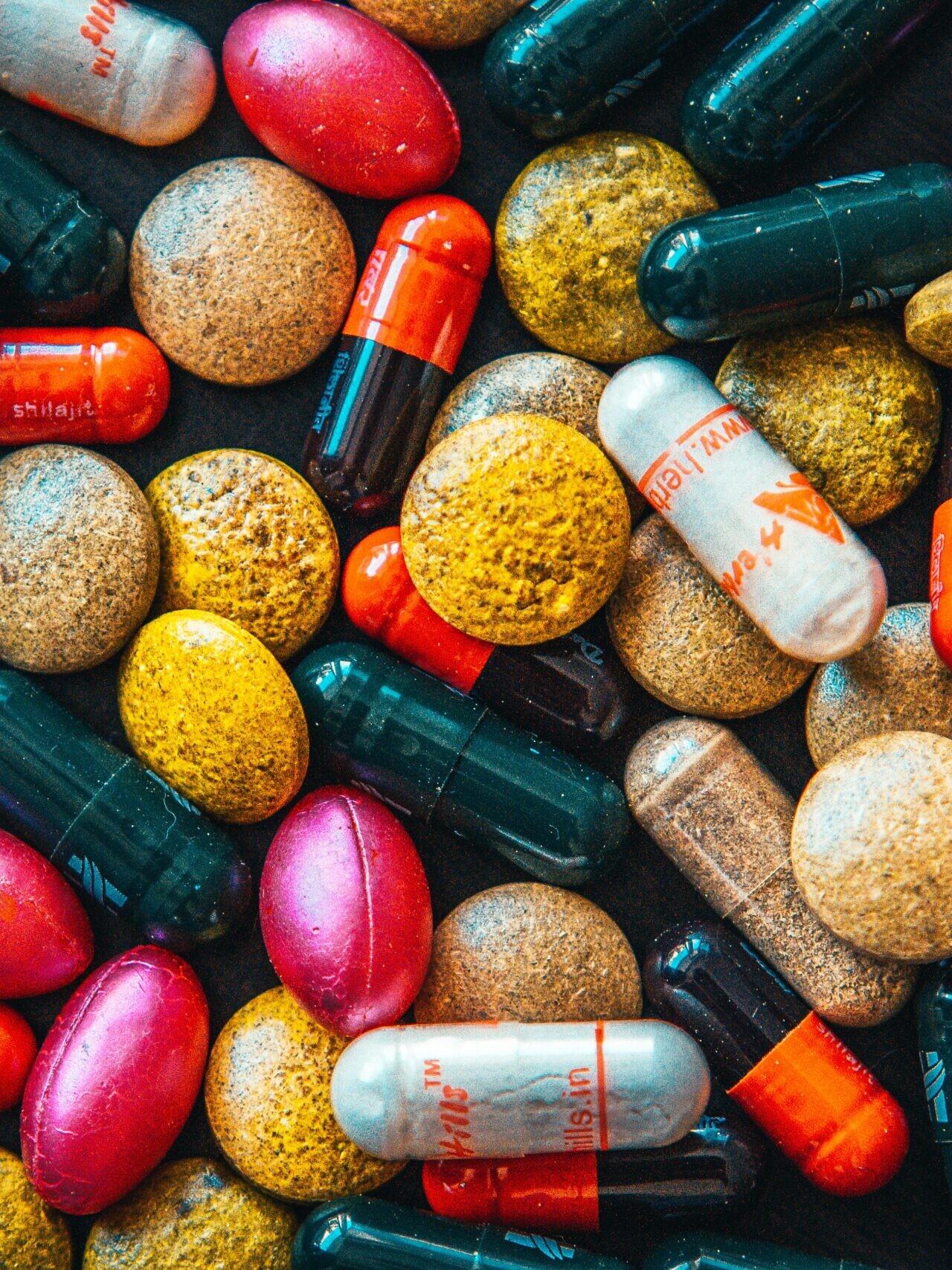 red and brown medication pill