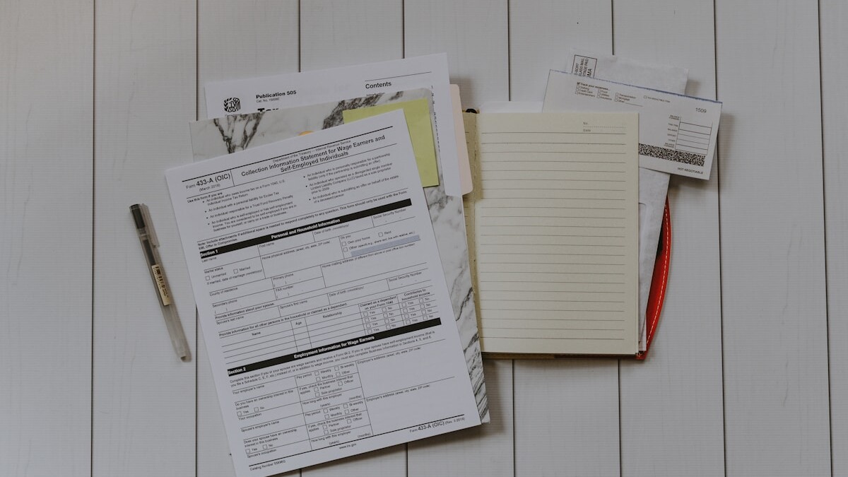 stack of papers flat lay photography