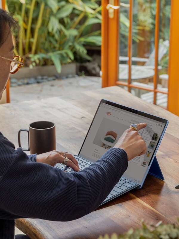 a woman using a laptop