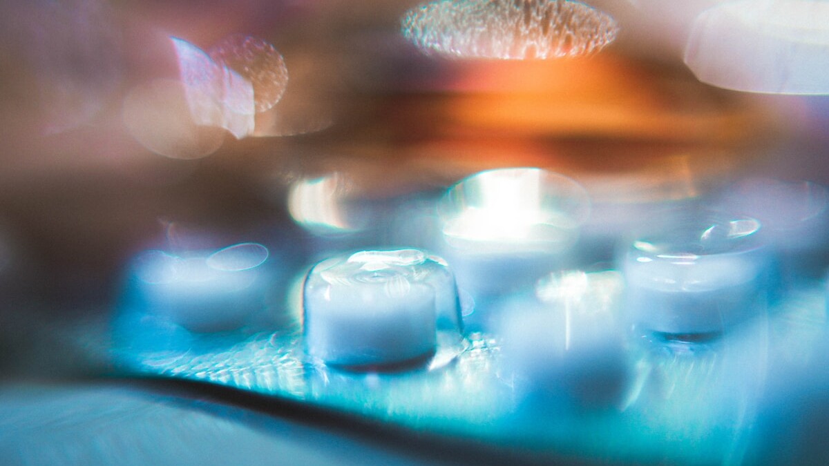 macro photography of glasses on tray