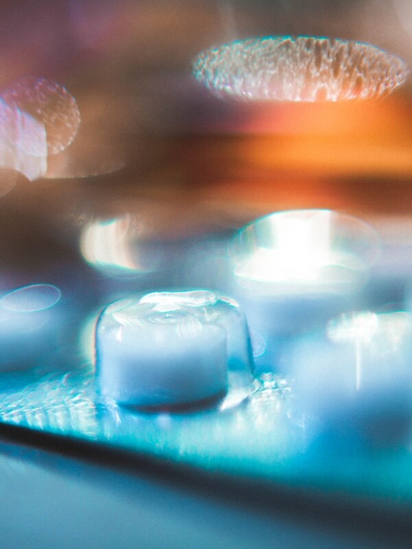 macro photography of glasses on tray