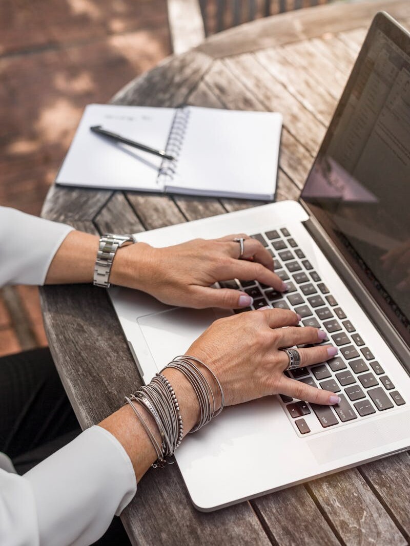 Photography of Person Using Macbook