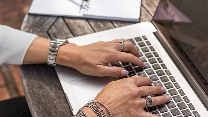 Photography of Person Using Macbook