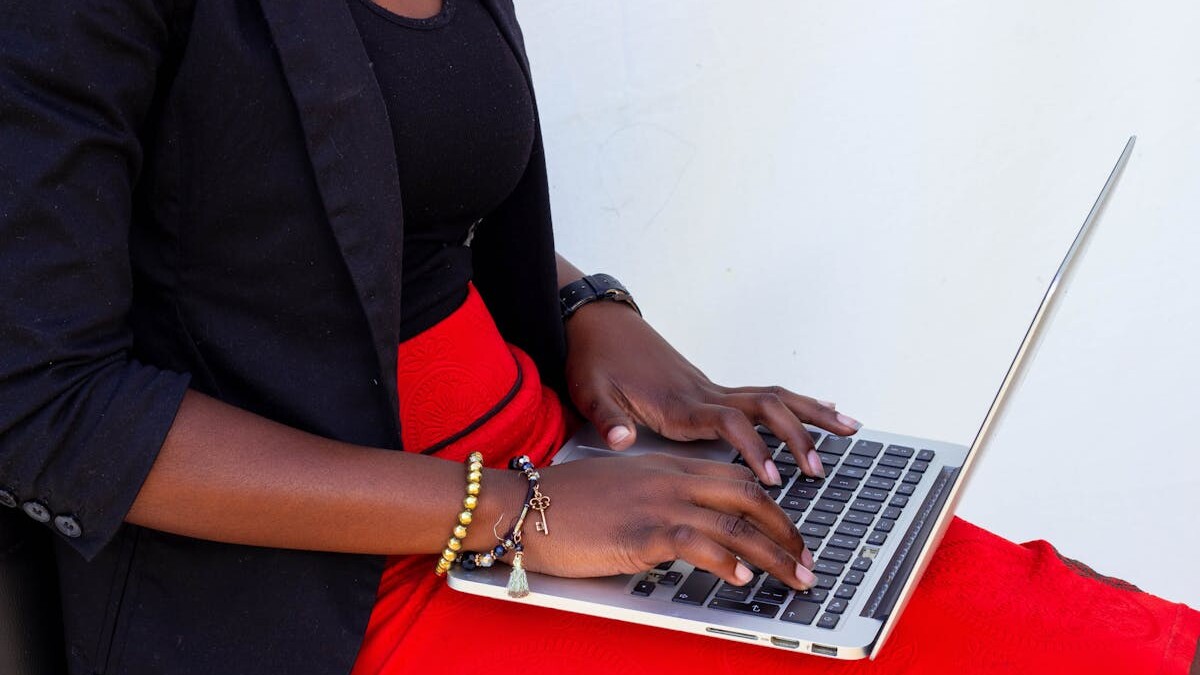 Photo of Woman Using a Laptop