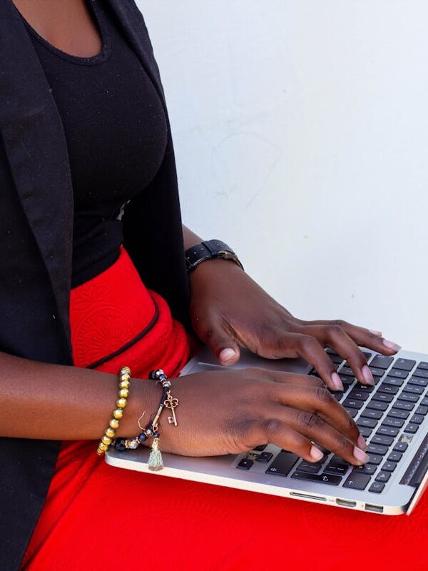 Photo of Woman Using a Laptop