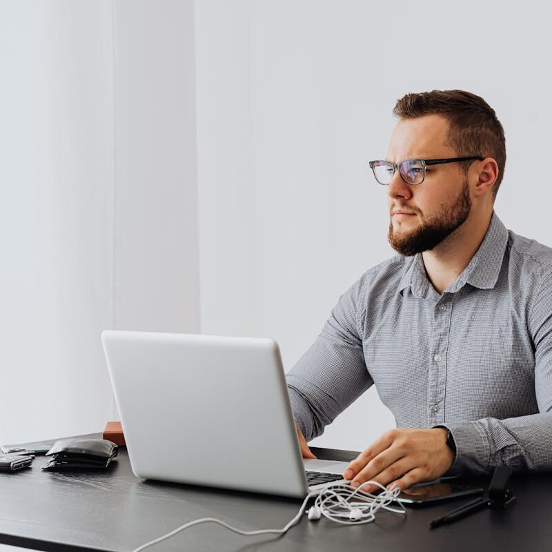 A Man Sitting at the Table