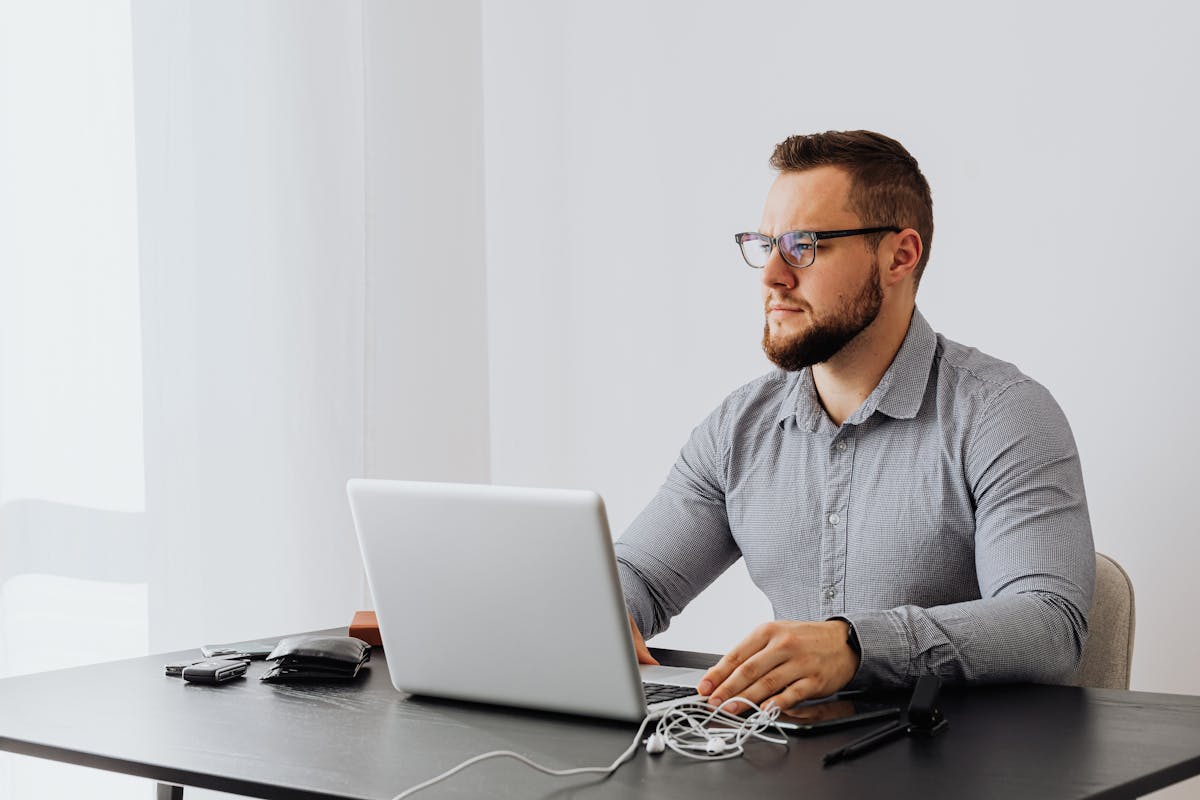 A Man Sitting at the Table